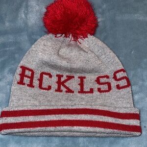 Young & Reckless Lane Change knit pom beanie in red and grey.